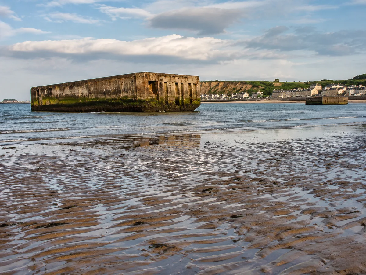 Mulberry harbour caissons offshore at Arromanches